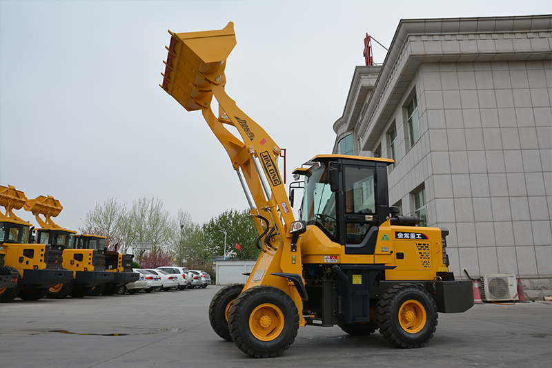 What are the characteristics of the loader steering system?